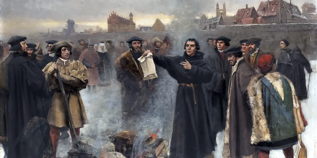 Luther burns the Papal bull in the square of Wittenberg year 1520. Karl Aspelin